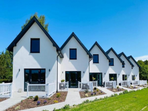 Two-storey holiday homes, pool, close to the beach